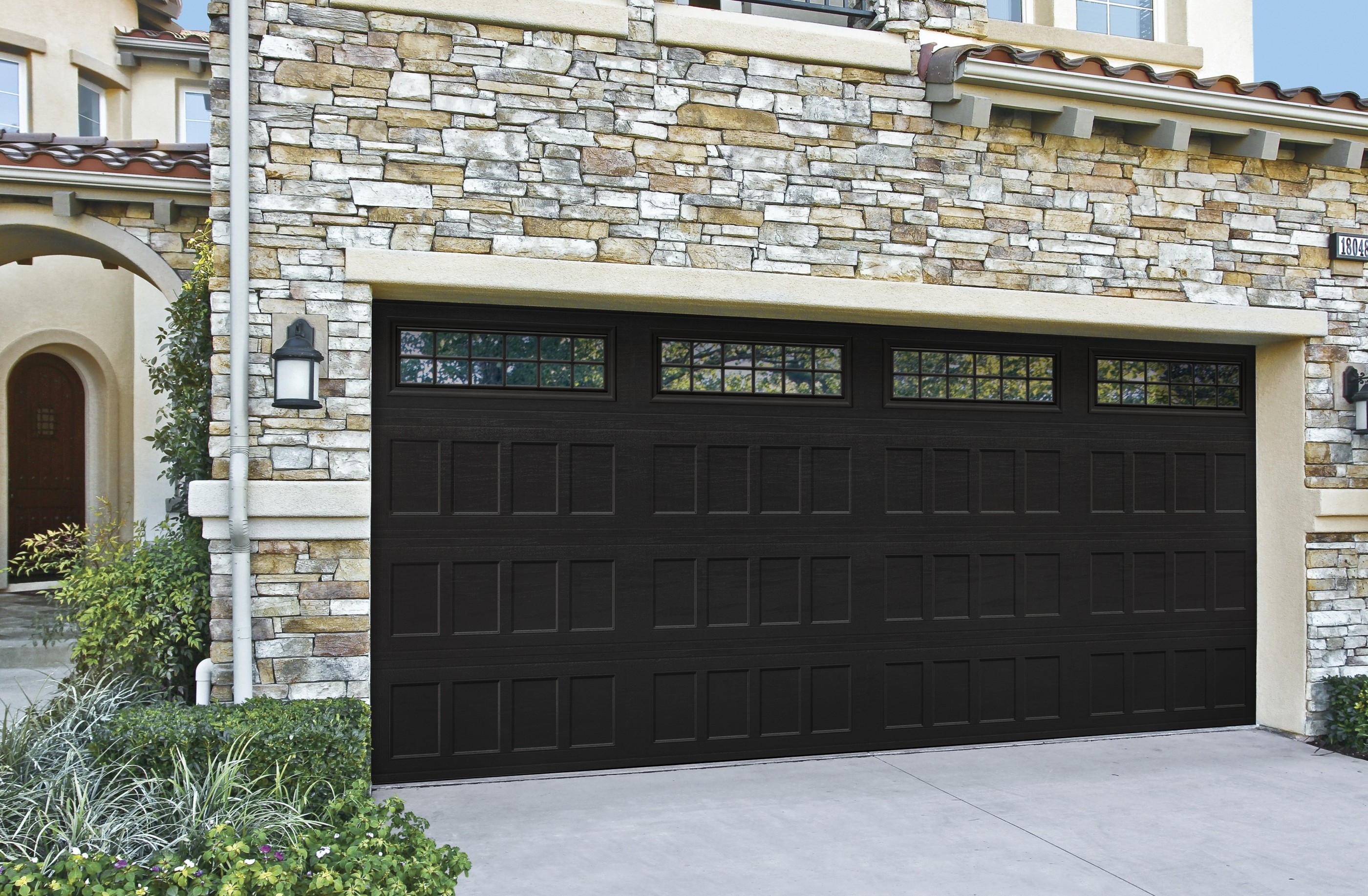 Black glazed steel double garage door